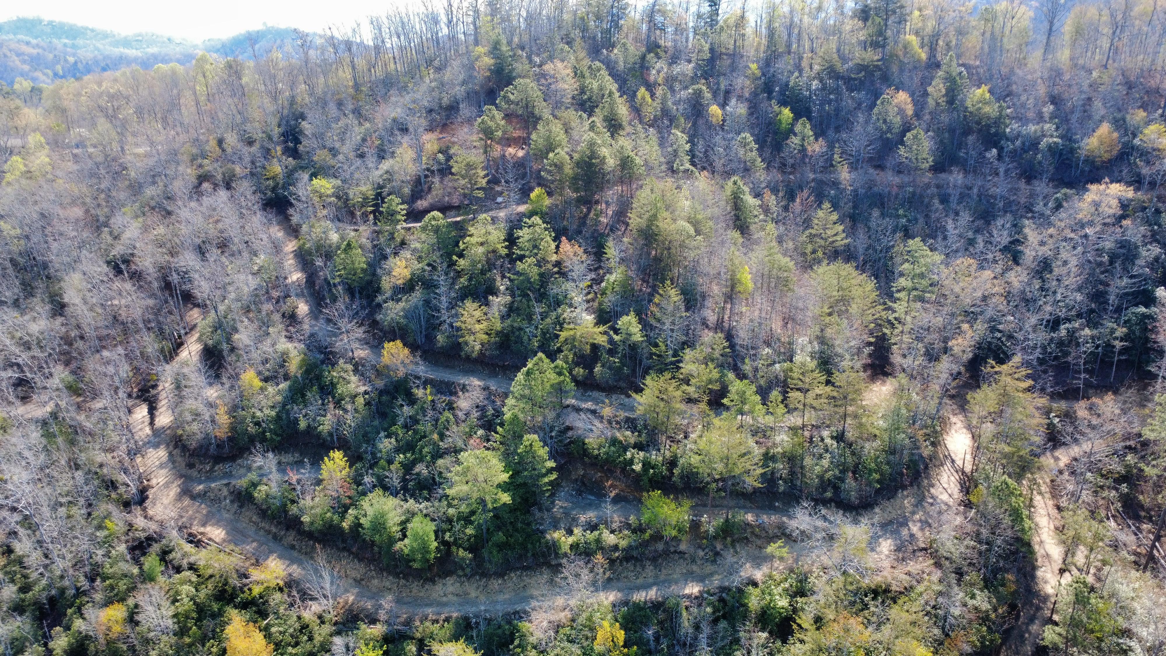 Sunset over the surrounding mountains from the site