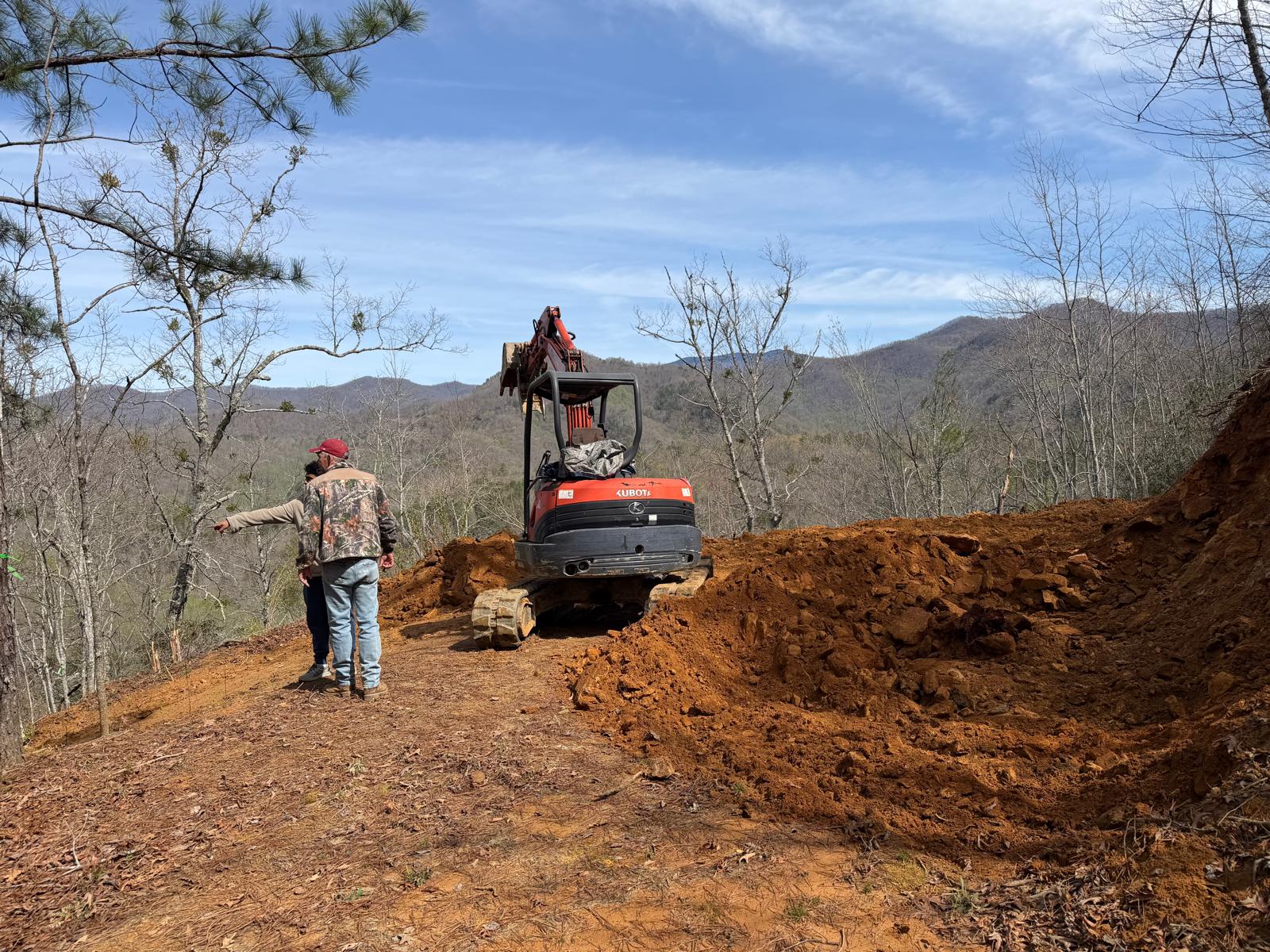 Site hillside grading with erosion control mats in place